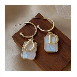Fashion statement drop Letter D earrings gold